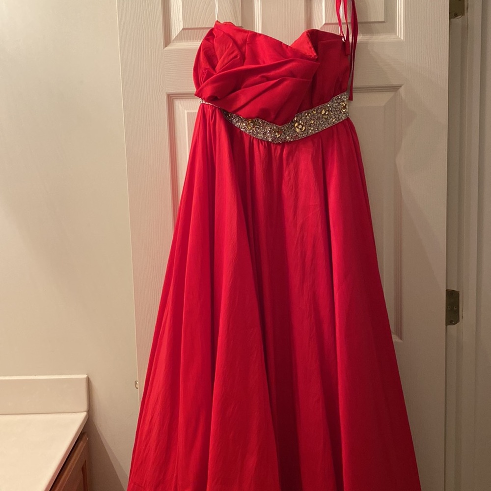 Beautiful Evening red ball gown. Lovely with jewels around the waist.
